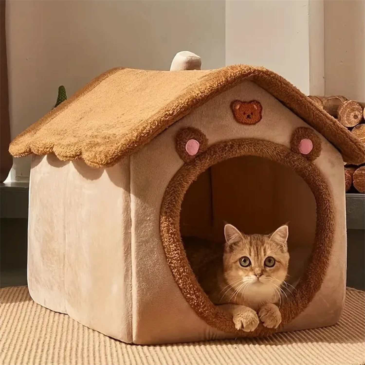 Cat peeking out from a cozy beige pet house with a brown roof