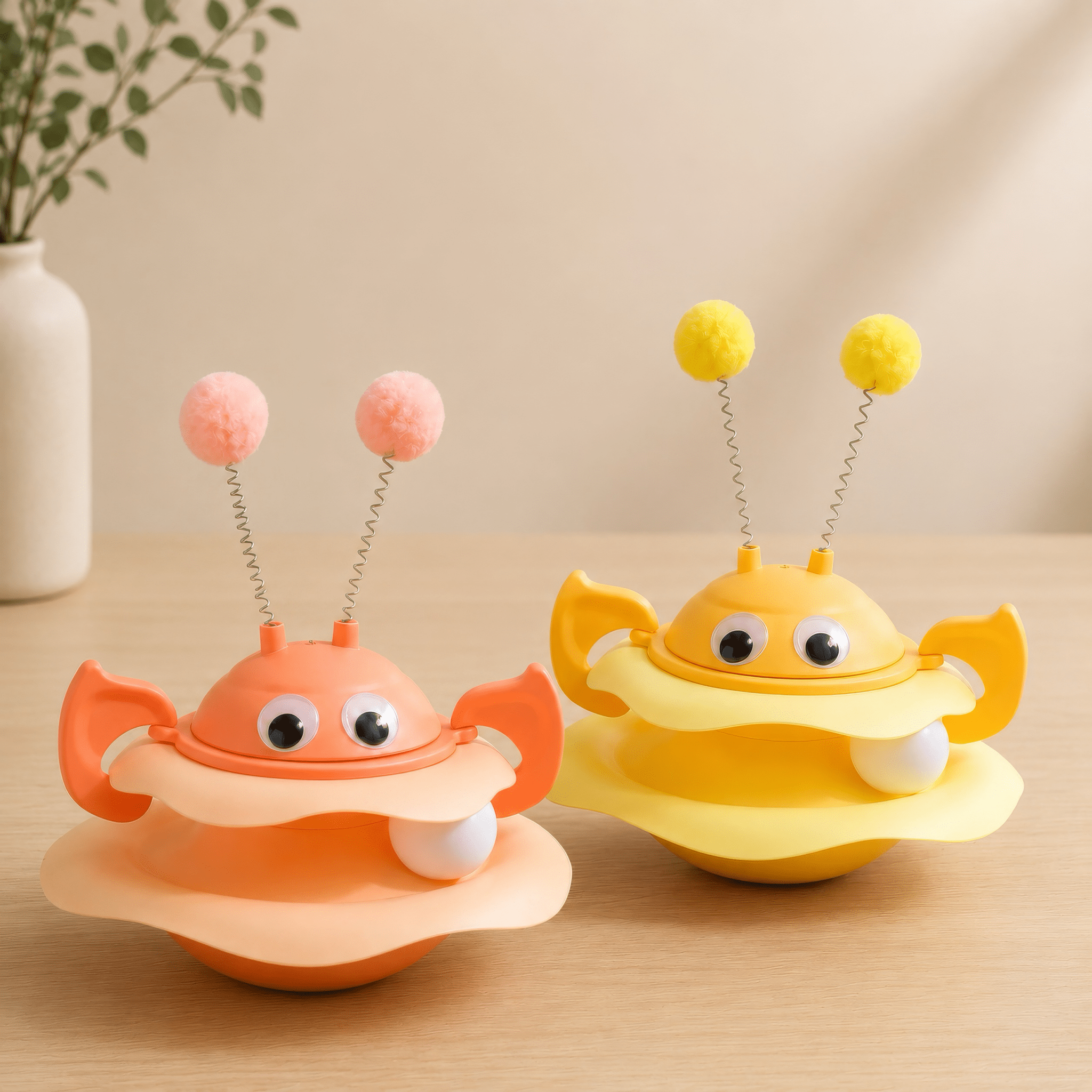 This bee cat toy tilts and bounces back when your cat swipes at it
