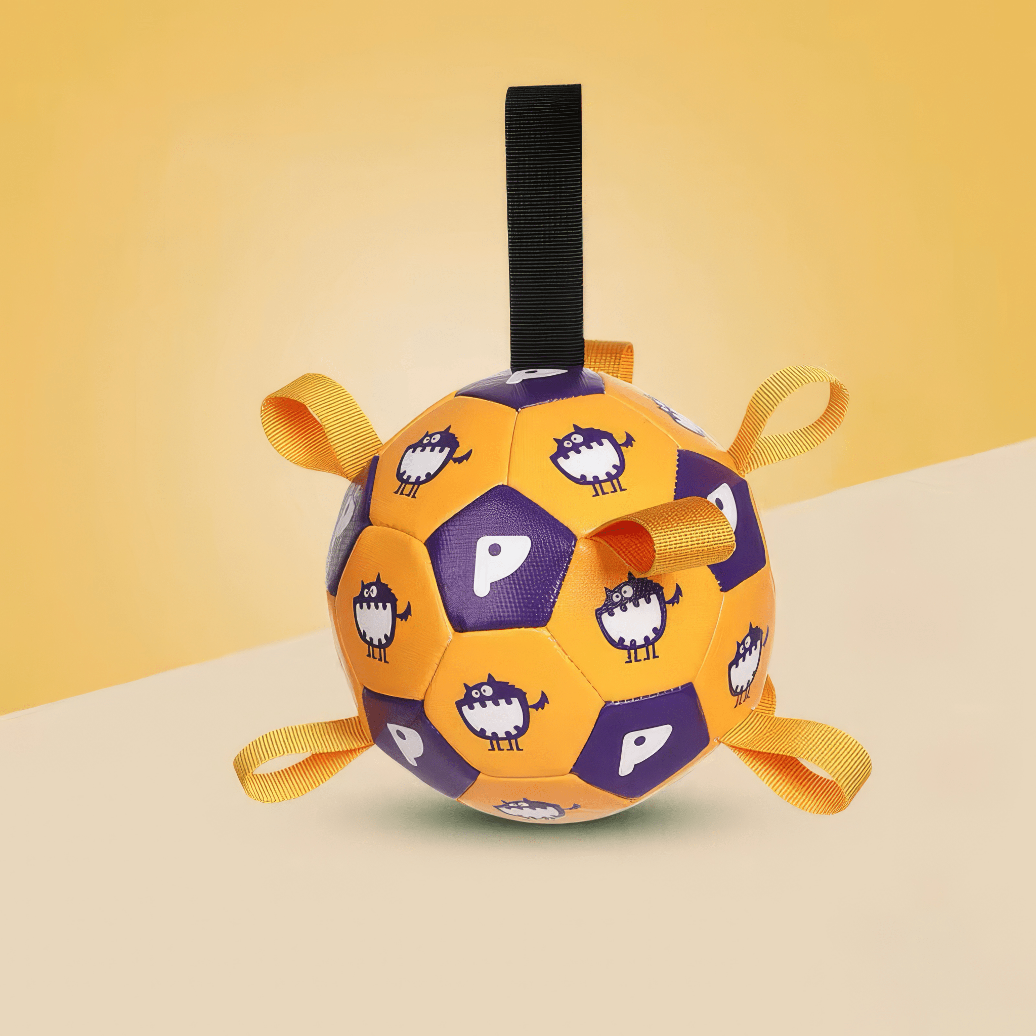 Purple soccer ball for dogs with cartoon characters on a beige background